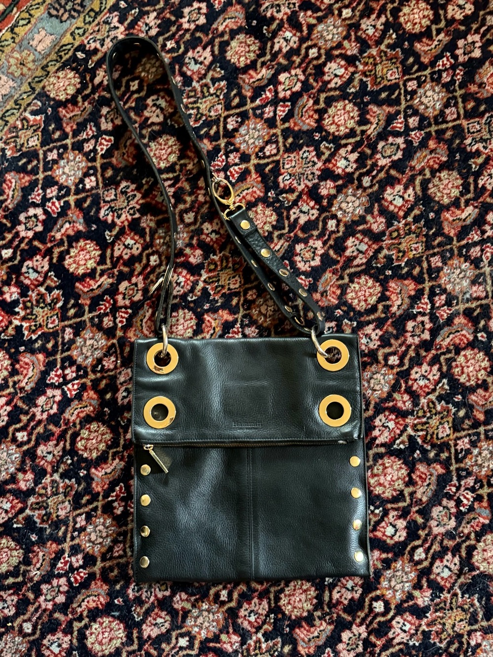 Hammitt Black leather crossbody with gold grommet hardware